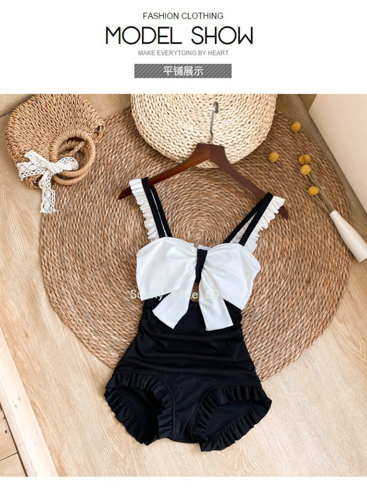 2022 New Women's Swim Suit One-Piece Ruffled Swim Wear Bow Backless Beach Jump Suits for Women Black White Conservative Swimwear
